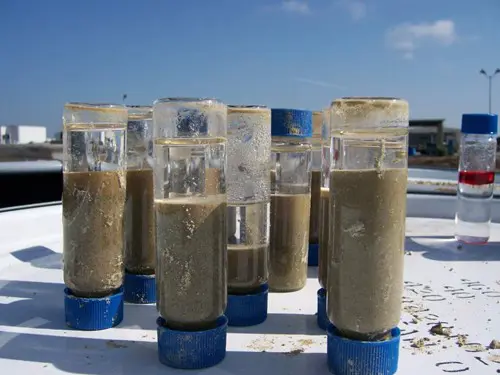 Drilling into the ground for soil and ground water samples.